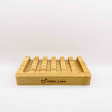 Green Llama displays their sustainable bamboo soap dish, promoting eco-friendly bathroom accessories.
