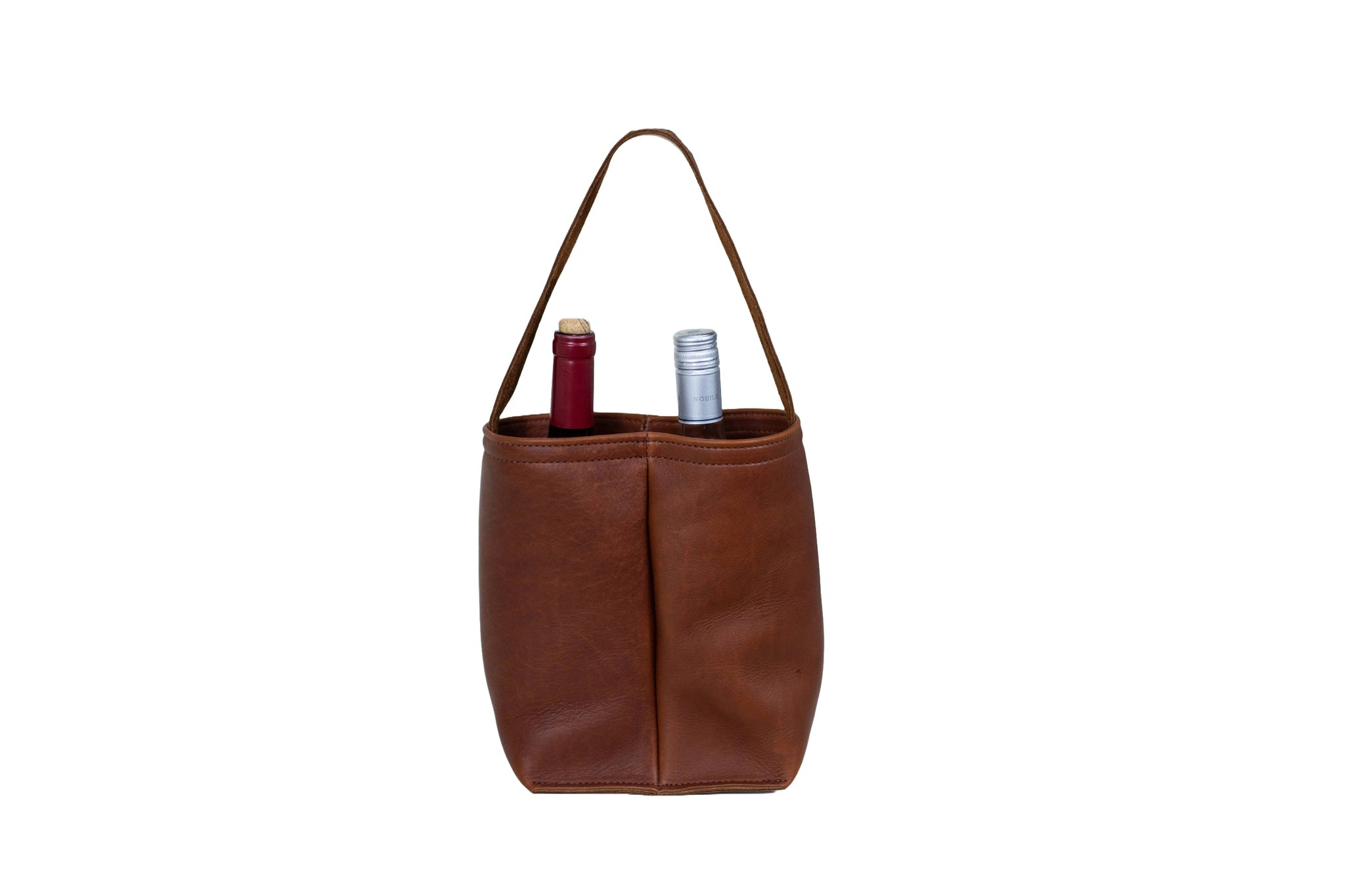 A brown leather wine tote bag holds a red and white wine bottle.
