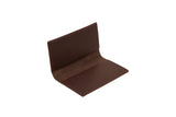 Shows an open, brown leather checkbook cover on a white background.
