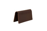 Showcases a brand new Urban Southern brown leather minimalist wallet.
