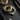 Two thumper tools, one gold and one silver, on a dark surface.