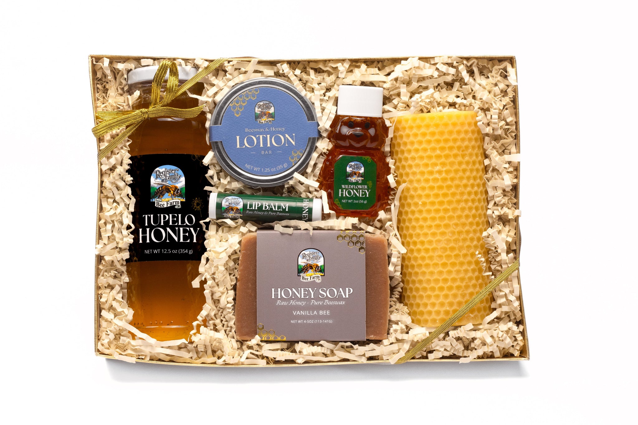 Showcase a Register Family Bee Farm gift box featuring tupelo honey, wildflower honey, honey lotion, honey soap, lip balm, and a beeswax candle.
