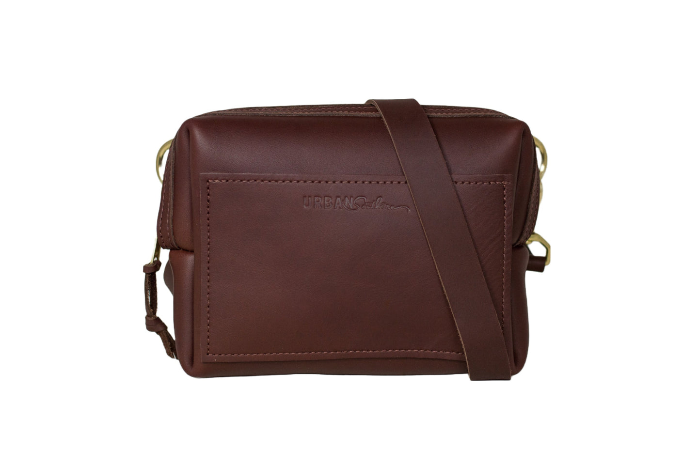 Showcases a stylish Urban Southern leather crossbody bag in rich brown.
