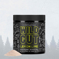 Showcases Wild Cut Lemon Lime dietary supplement powder in a black jar against a snowy backdrop.