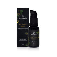 Annmarie Wild Fruit Serum bottle and box stand side-by-side, showcasing the brightening facial complex for all skin types.

