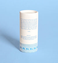 Displaying a VanMan Company natural deodorant in eco-friendly packaging, showing ingredients and philosophy.
