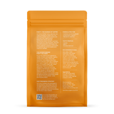 Purity Coffee's orange bag promotes organic, lightly caffeinated Balance blend featuring vanilla, berry, and roasted almond notes, formulated for caffeine-sensitive individuals.
