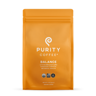 Purity Coffee bag showcases "Balance," a 2/3 decaffeinated, USDA Organic, Bird Friendly, and naturally water-processed ground coffee for metabolic health.
