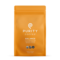 Purity Coffee bag showcases "Balance," a 2/3 decaffeinated, USDA Organic, Bird Friendly, and naturally water-processed ground coffee for metabolic health.
