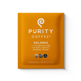 Purity Coffee advertises its Balance blend, a two-thirds decaffeinated coffee consciously crafted for metabolic health, in a single-serving sachet.
