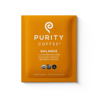 Purity Coffee advertises its Balance blend, a two-thirds decaffeinated coffee consciously crafted for metabolic health, in a single-serving sachet.

