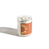 A jar labeled "Cactus Milk" from URB. Apothecary contains a powdery, light-colored skincare product.
