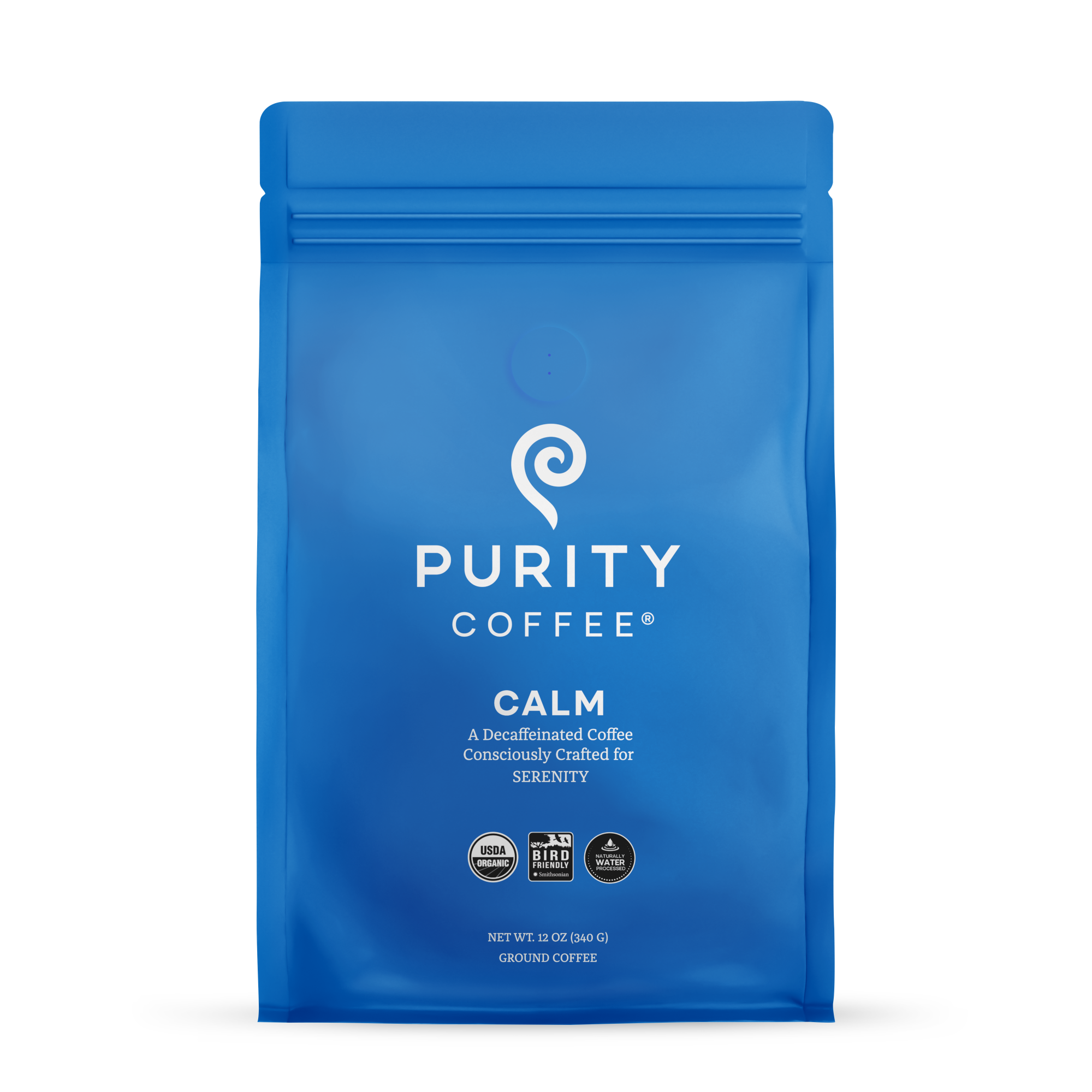 Showcases a blue bag of Purity Coffee Calm, a decaffeinated and consciously crafted ground coffee for serenity.
