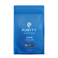 Purity Coffee's blue bag features Calm decaffeinated whole bean coffee, promising serenity with its USDA organic and bird-friendly blend.

