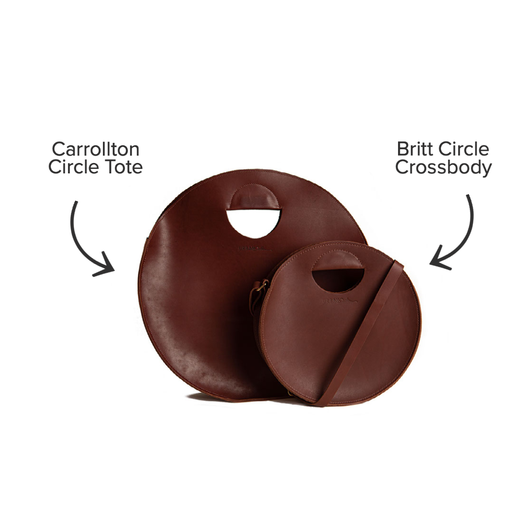 Two brown leather circle handbags, a Carrollton Tote and Britt Circle Crossbody, sit against a white backdrop.
