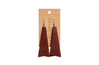 Urban Southern displays brown leather dangle earrings on a kraft paper card.

