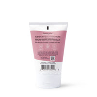 Examine Dabble & Dollop Layering Lotion bottle revealing its natural, vegan, and cruelty-free moisturizing ingredients.