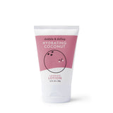 Dabble & Dollop sells hydrating coconut layering lotion in a white tube with a cartoon coconut on the pink label.
