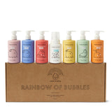 Dabble & Dollop presents a rainbow of seven colorful, fruit-scented 3-in-1 bath products for kids, including coconut, blueberry, and strawberry gel.
