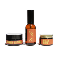 Shows a Goji Nectar Cleansing Balm, Sweetgrass Apothecary Spray, and Solterra Tallow on a white background.
