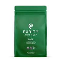 Purity Coffee sells "Ease," a dark roast ground coffee designed to support digestive health, packaged in a green bag with USDA Organic and Bird Friendly certifications.
