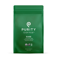 Purity Coffee advertises their "Ease" dark roast whole bean coffee, consciously crafted for digestive health, on a green USDA Organic and bird-friendly certified bag.