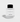 Jack Henry Frequency cologne bottle sits on a white surface.

