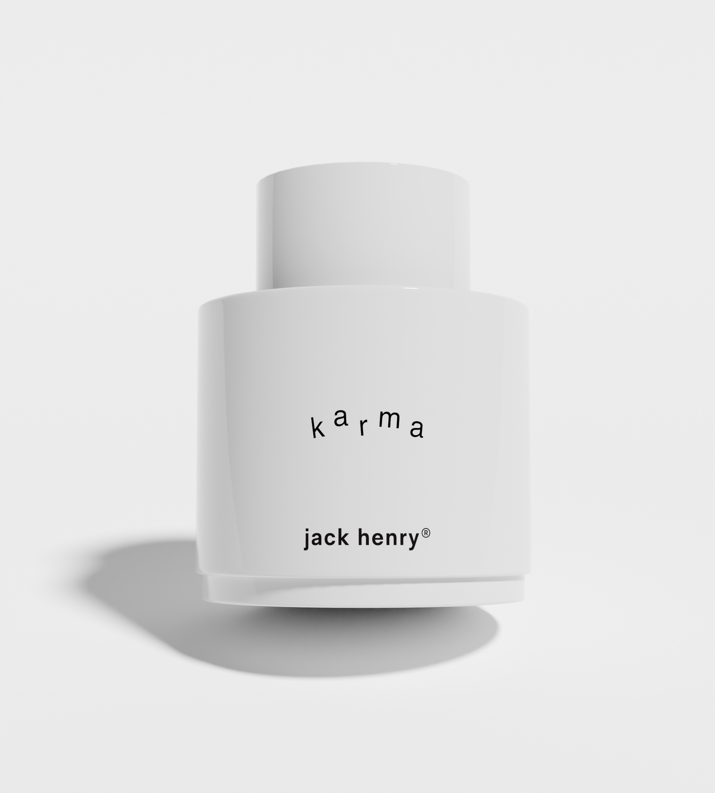 A white Jack Henry "Karma" moisturizer bottle sits on a white background.
