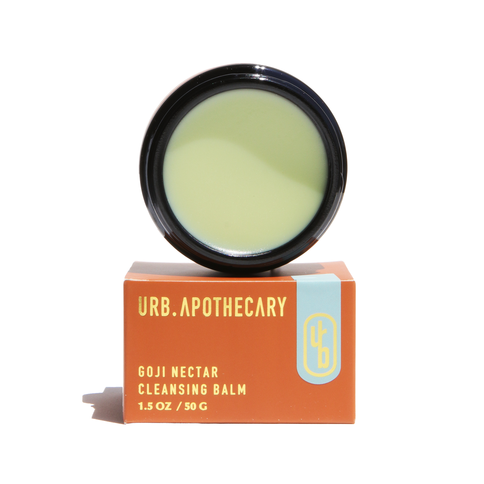 URB Apothecary Goji Nectar Cleansing Balm sits atop its packaging box, ready for gentle facial cleansing.

