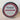 Viewers examine a tin of Rogue Evergreens Incense Cedar beard balm handcrafted from wild-harvested boughs in Ashland, Oregon, boasting 100% natural, paraben-free ingredients.
