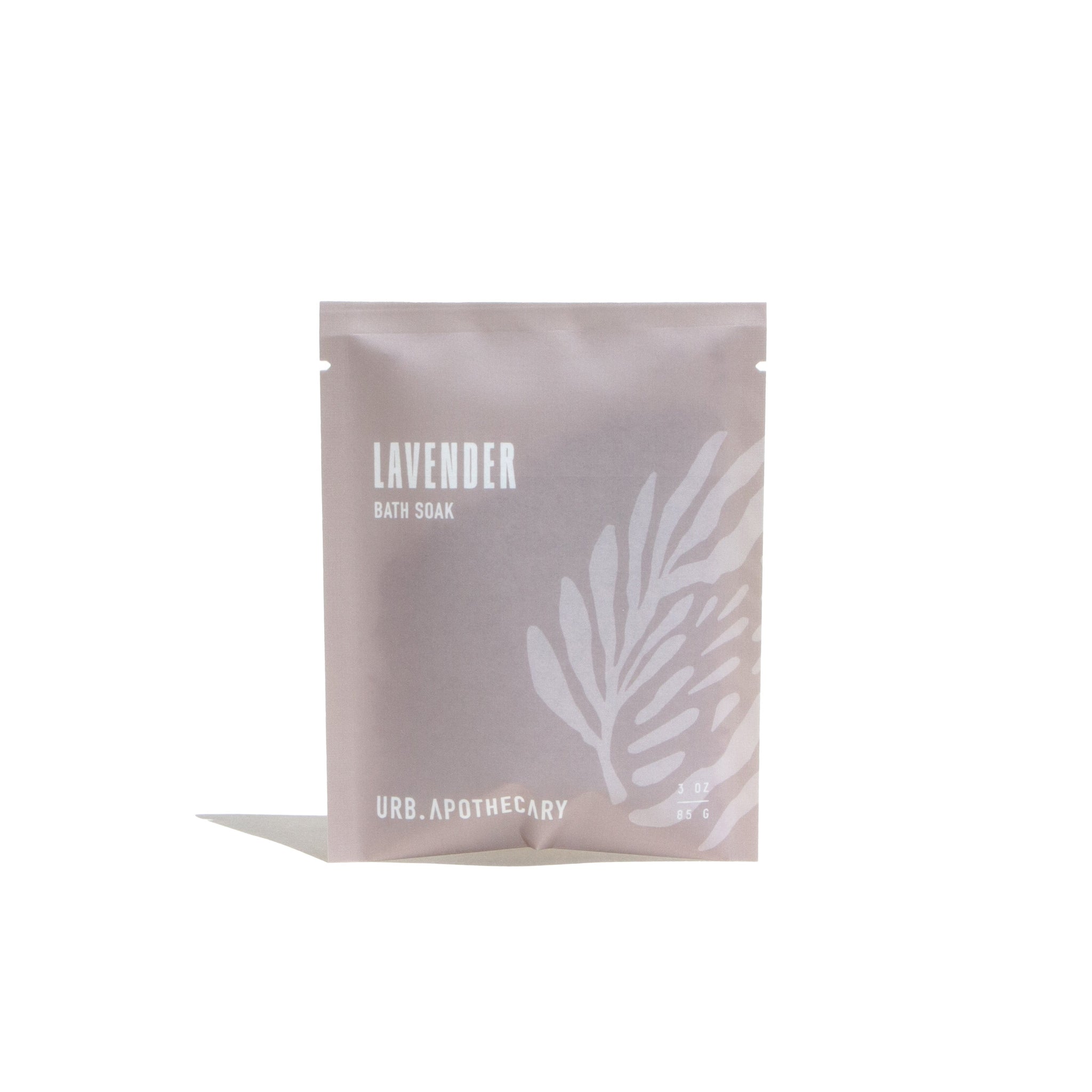 Urb Apothecary sells lavender bath soak in a pale gray package with a leaf design.
