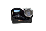 The black felt purse organizer displays a phone, pen, mints, lip gloss, and a Bevanda-branded travel mug.
