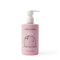 Dabble & Dollop sells its tear-free coconut gel, which functions as a bubbles, body wash, and shampoo, in a pink pump bottle.

