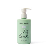 Dabble & Dollop Honeydew Gel body wash, bubbles, and shampoo features a cute honeydew slice on its light green bottle with a pump.
