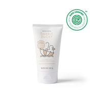 Dabble Ducky infant balm tube displays its EWG verified seal, emphasizing its design for delicate infant skin.
