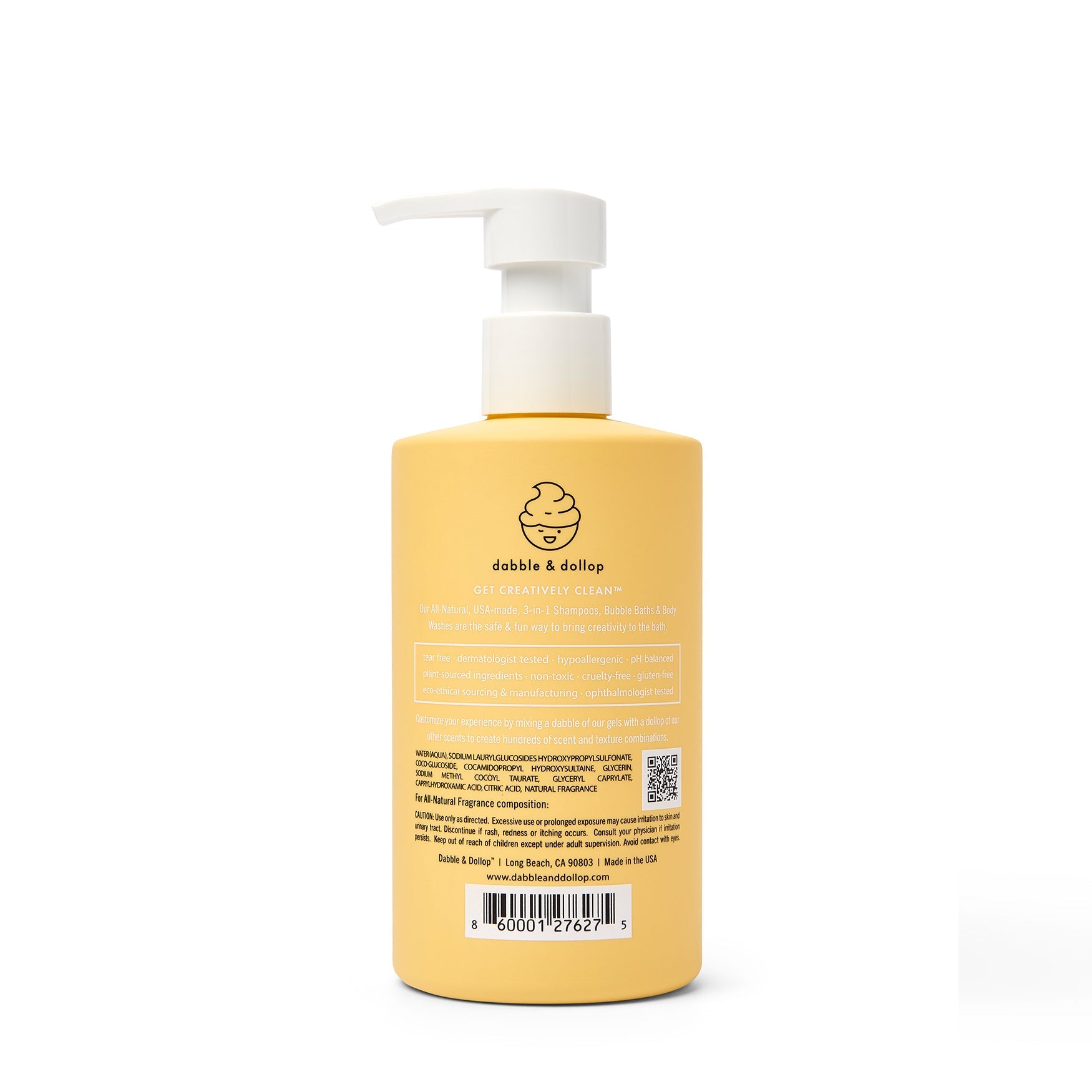 Dabble & Dollop all-natural shampoo in a yellow bottle offers tear-free, dermatologist-tested, and cruelty-free bathing.
