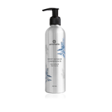 Annmarie Sweet Sunrise Conditioner in a silver bottle with a black pump dispenser showcases herb-infused hair care.

