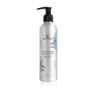 Annmarie Sweet Sunrise Conditioner in a silver bottle with a black pump dispenser showcases herb-infused hair care.

