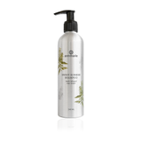 Annmarie Sweet Sunrise Shampoo bottle displays herb-infused hair wash.
