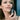 A woman promotes Annmarie Phyto Nutrient Cleanser for healthy skin.
