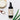 Annmarie Aloe Herb Cleanser sits with a scoop of cream and aloe leaves, promoting organic facial care.
