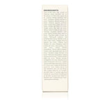 Lists natural ingredients, including coconut oil, aloe vera, and various plant extracts, in a skincare product.
