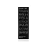 Cosmetic product packaging lists a long array of natural ingredients, including aloe, lavender, calendula, and various seed extracts, emphasizing its organically grown or wildcrafted composition.