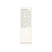 Close-up shows the skincare product ingredients list, featuring grape seed oil, camellia, rosehip, lavender, and pomegranate, emphasizing organic and natural beauty.
