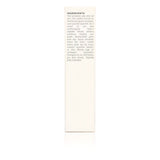 Close-up of a product label lists natural and organic ingredients like aloe vera, coconut oil, bamboo, and lavender for skincare or beauty.
