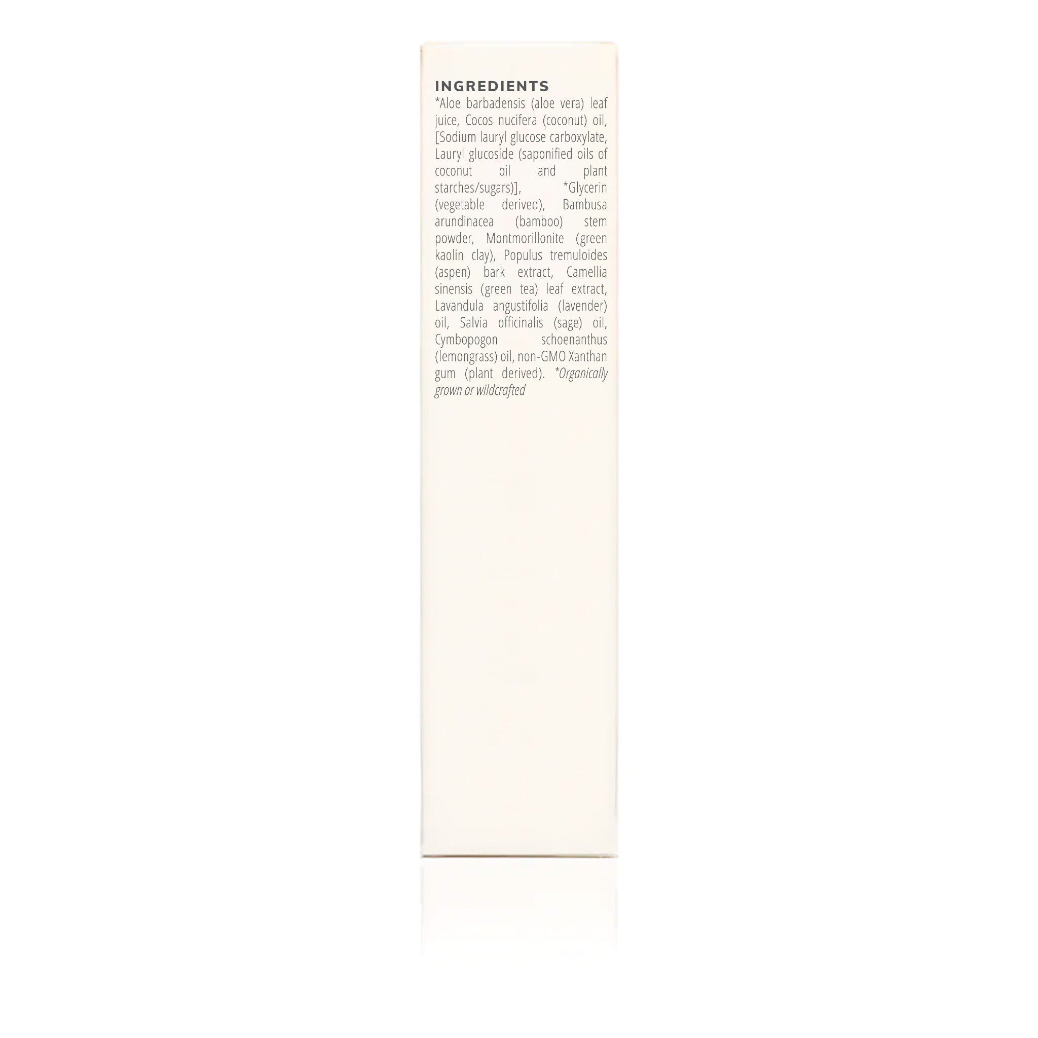 Close-up of a product label lists natural and organic ingredients like aloe vera, coconut oil, bamboo, and lavender for skincare or beauty.
