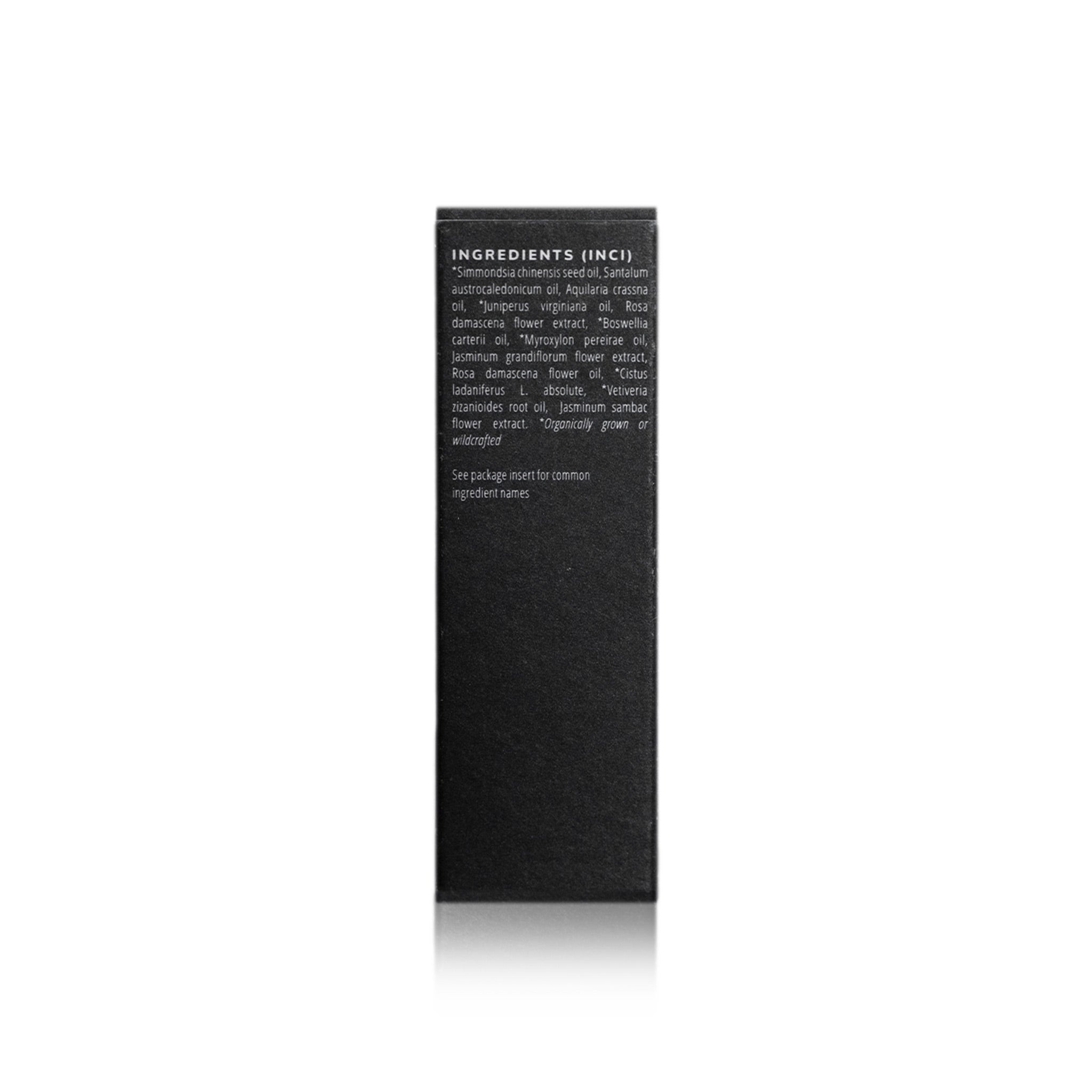 Close-up showcases the natural and organic ingredients list on a skincare product's packaging.
