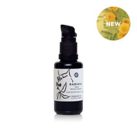 Showcases Radiate Facial Moisturizing Oil in a black bottle with a pump, marked "NEW," for radiant skin.
