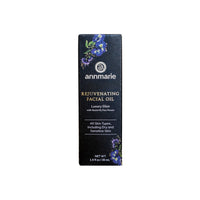 Annmarie's Rejuvenating Facial Oil box displays blue butterfly pea flower as a luxury elixir for all skin types.
