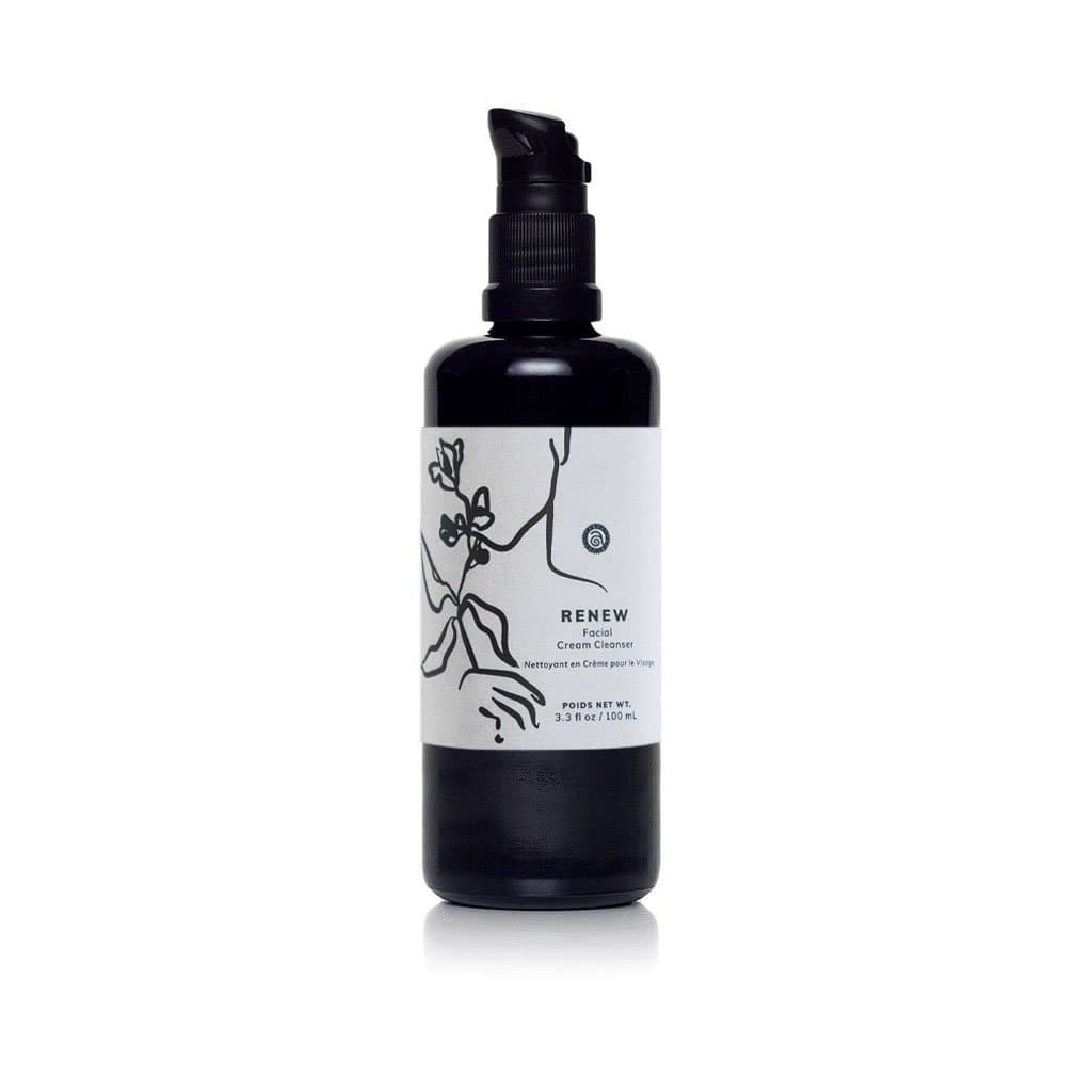 A black bottle holds Renew facial cream cleanser with botanical illustrations and a pump dispenser.
